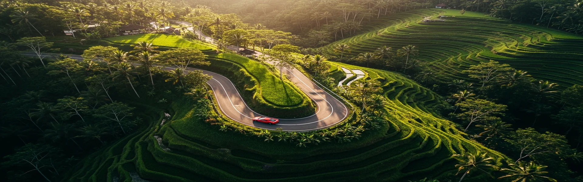 Luxury car tour Bali - aerial view of car on mountain road
