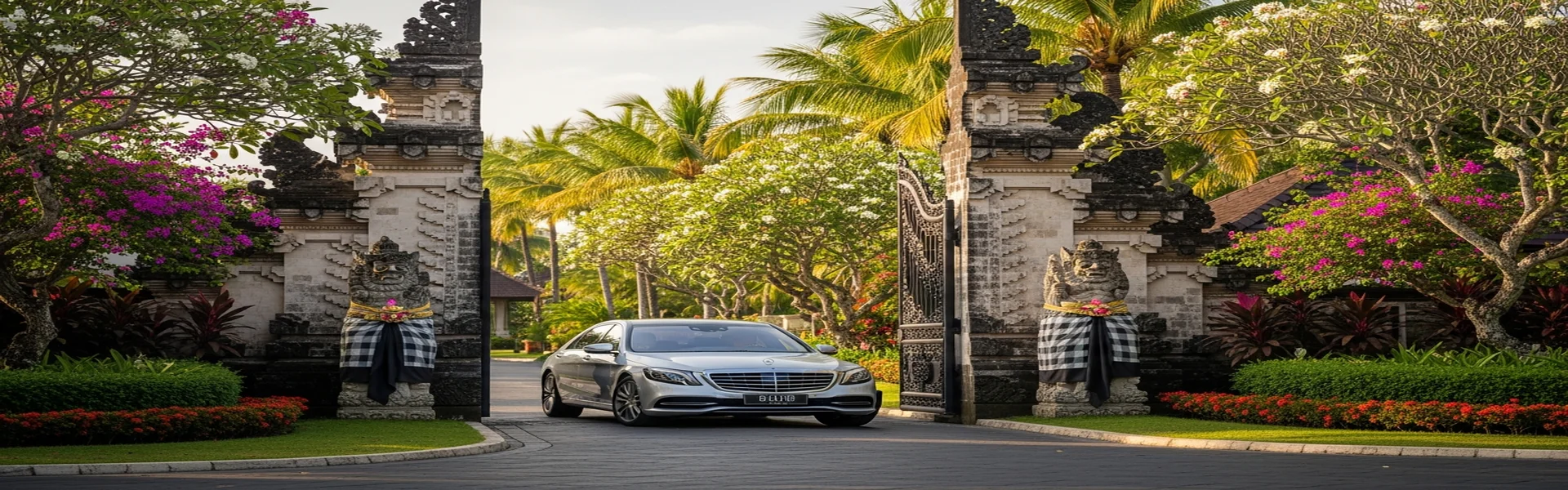 Luxury car rental Nusa Dua - premium sedan at resort gate