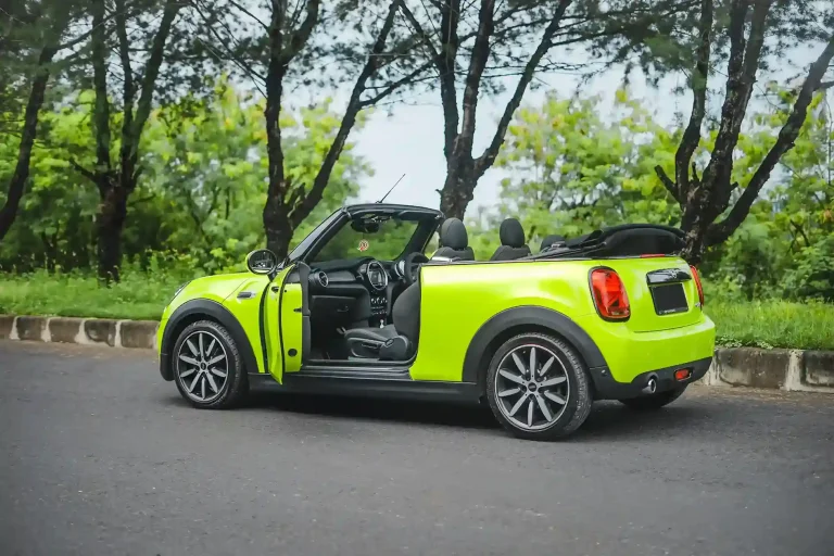 Green MINI Cooper convertible rental in Bali